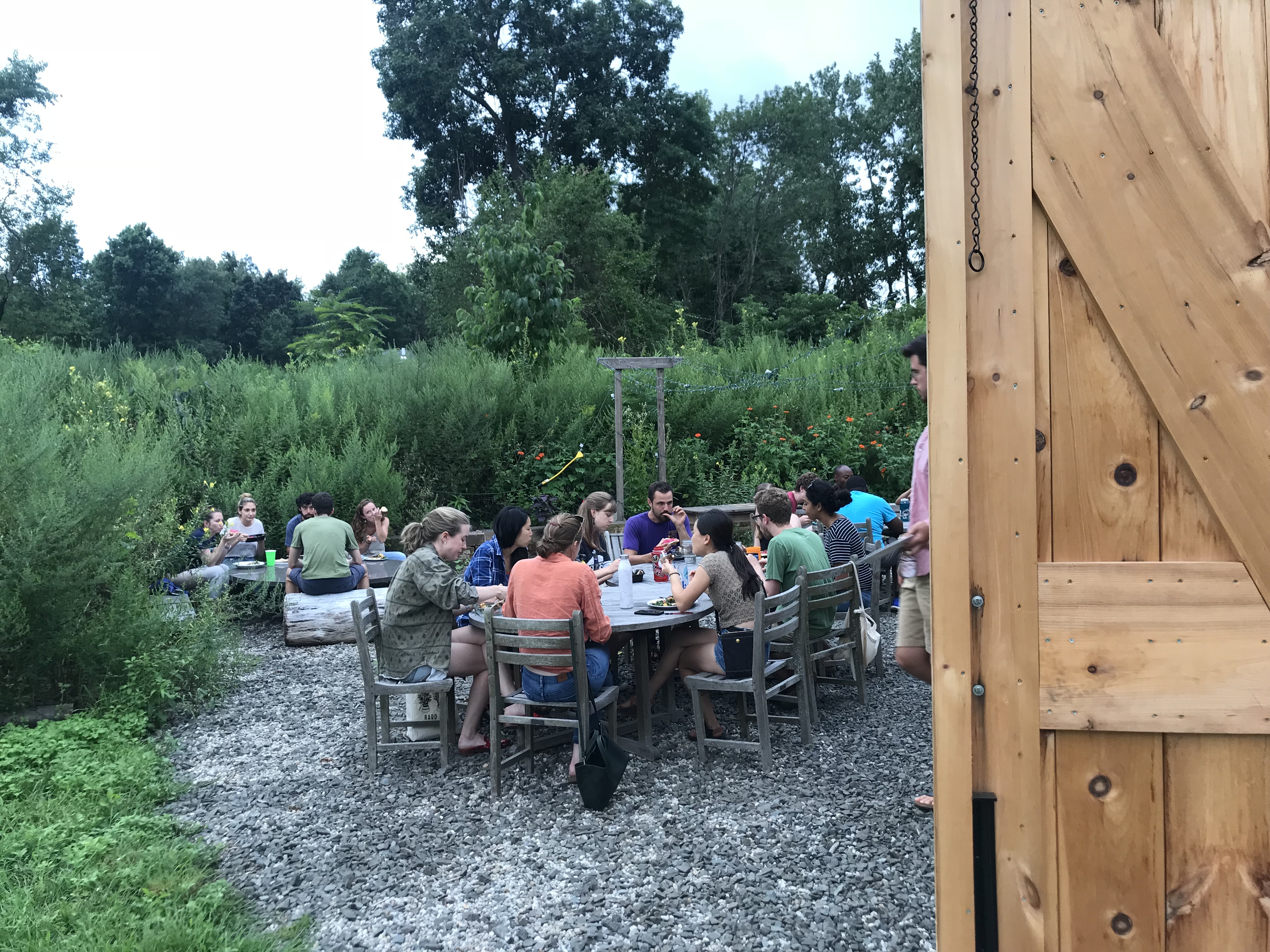 Students eat outdoors at Yale Landscape Lab